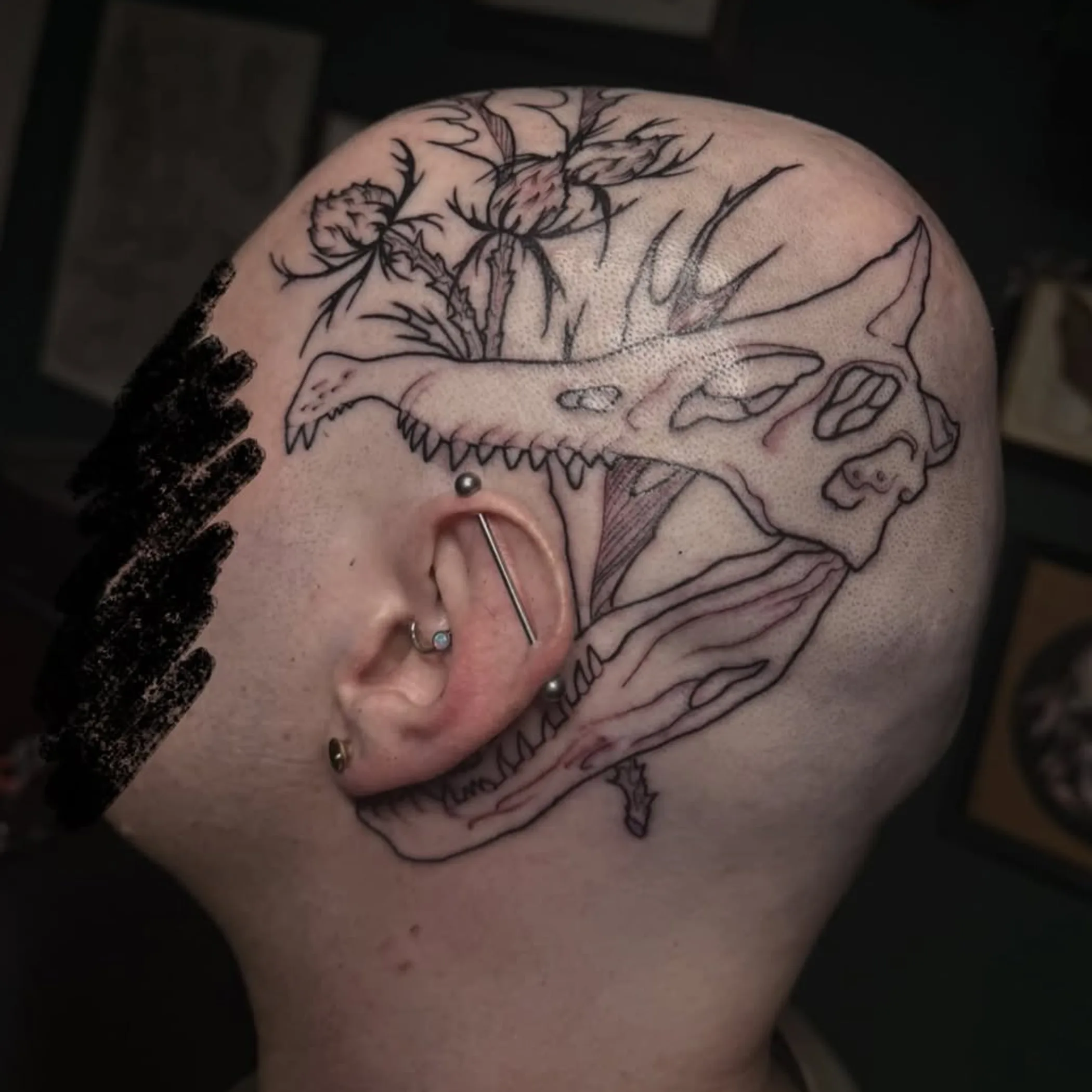 visible head tattoo
