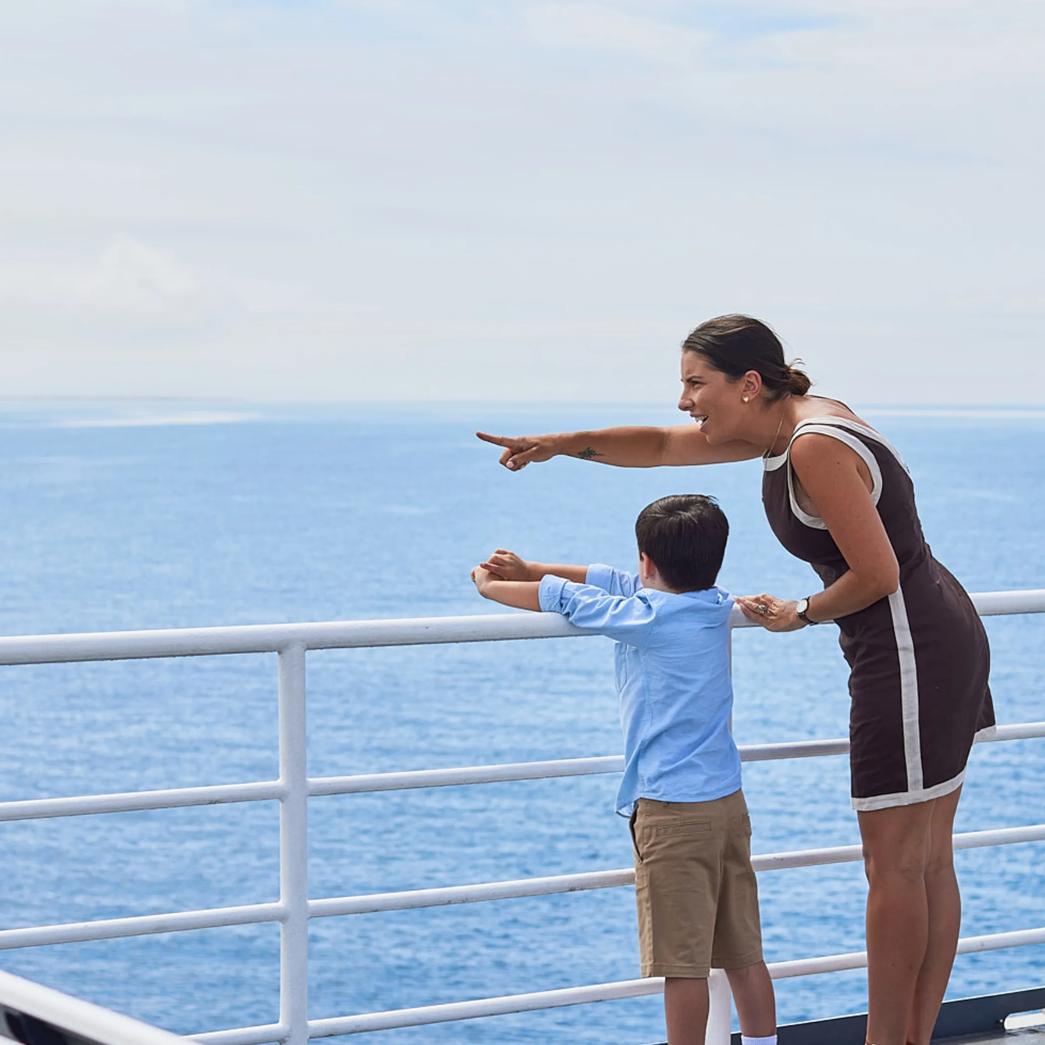 family enjoying coastal ferry trip